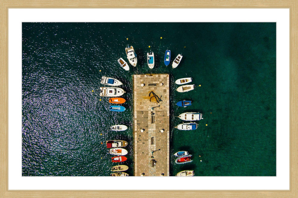 "Boats Docked" Framed Print by Karolis Janulis
