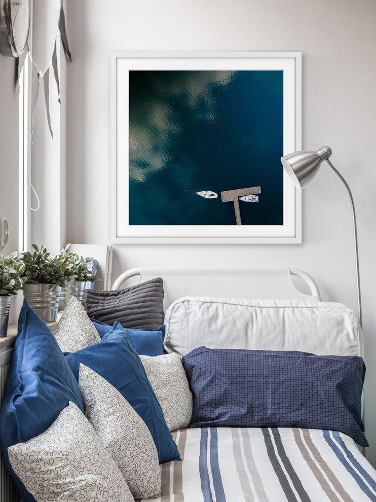 "White Boats Calm Lake" Framed Print by Karolis Janulis