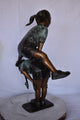 Two Girls Playing Leapfrog Jumping Bronze Statue Size: 30"L x 14"W x 34"H.