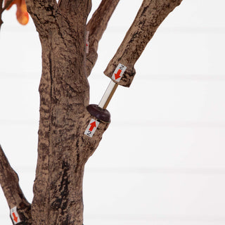 Close-up of trunk with assembly indicators, suggesting setup/instruction.