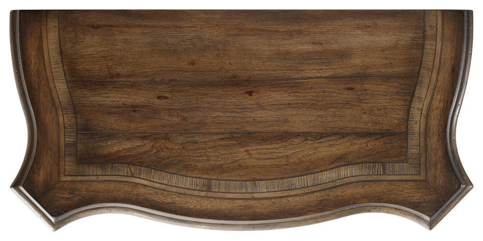 Close-up of a curved drawer-front feature on a white background.
