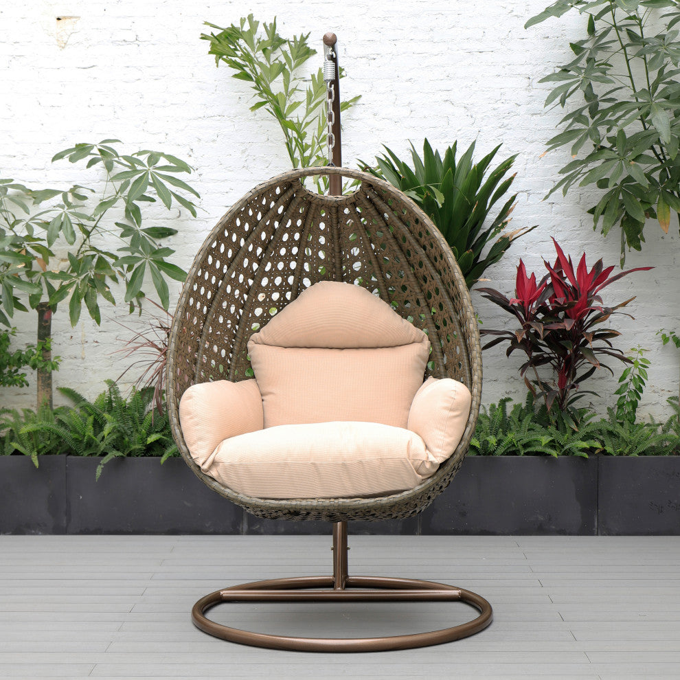 LeisureMod Beige Wicker Hanging Egg Swing Chair With Stand and Cushion, Beige