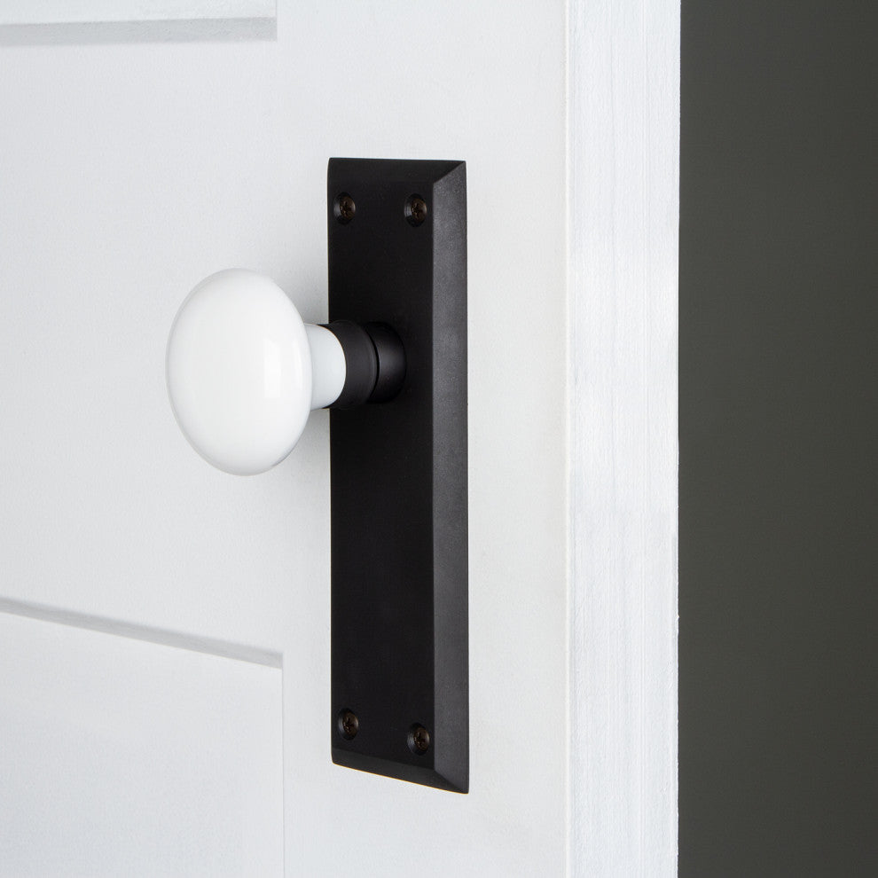 Single New York Plate With White Porcelain Knob, Oil-Rubbed Bronze
