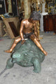 Two Kids on a Giant Turtle Bronze Fountain -  Size: 23"L x 60"W x 33"H.