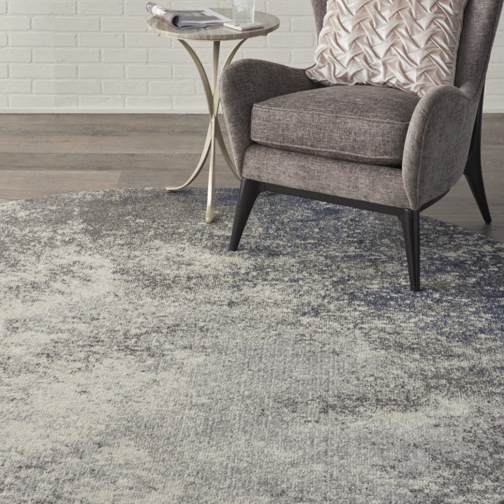 8 Round Charcoal and Ivory Abstract Area Rug