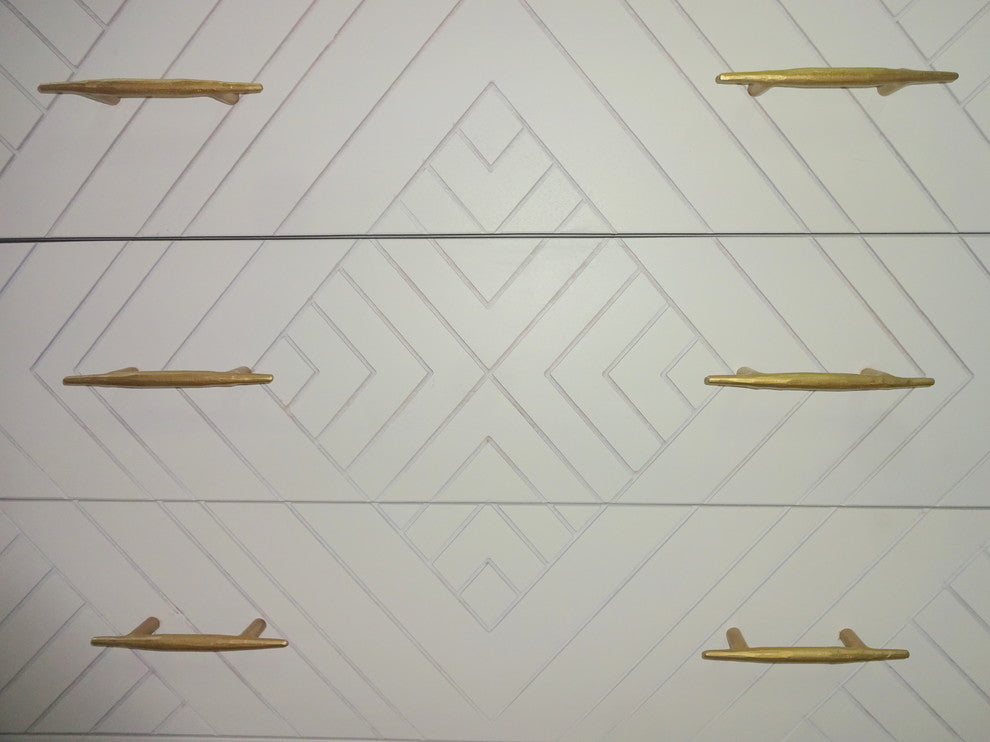 Close-up crop of the drawer-front pattern and hardware on white background.