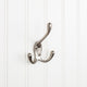 4" Triple zinc wall mount hook. Finish: SN.