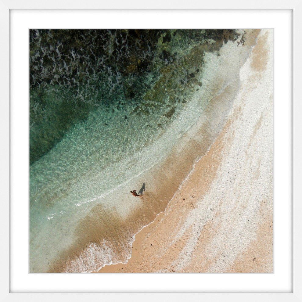 "Walking In The Sand" Framed Print by Karolis Janulis