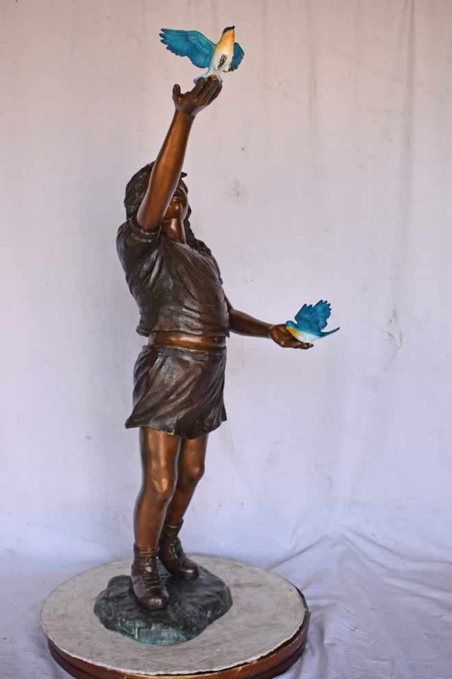 Girl, sandy, with two Blue birds Bronze Statue - Size: 25"L x 23"W x 41"H.