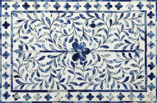 Close-up crop showing bone-inlay floral pattern on white background.