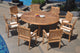 9-Piece Outdoor Teak Dining Set: 72" Round Table, 8 Leveb Stacking Arm Chairs