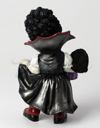 Cosplay Kids Vampire Girl Holding A Vamp Doll Statue