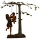 Swing Set Under A Three Bronze Statue -  Size: 60"L x 33"W x 60"H.