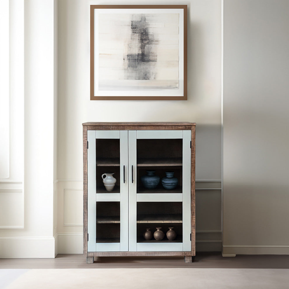 Lifestyle image showing the cabinet in a real room setting with decor; full product visibility.