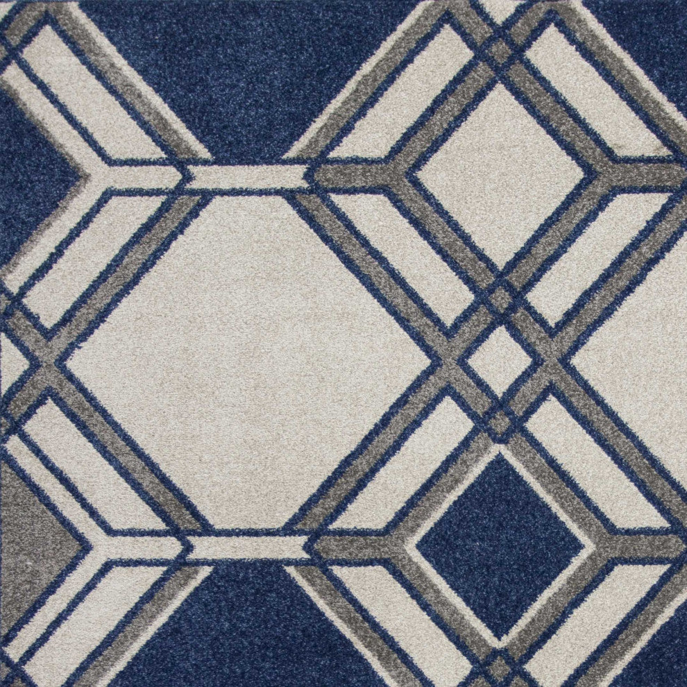 HomeRoots 7' x 10' UV treated Polypropylene Ivory or Denim Area Rug