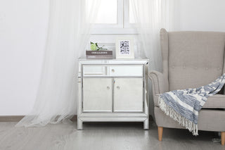 Lifestyle shot in a room showing front view of cabinet with accessories.