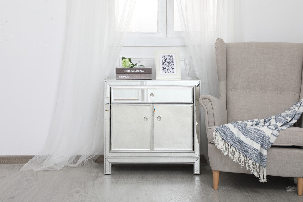 Lifestyle shot in a room showing front view of cabinet with accessories.