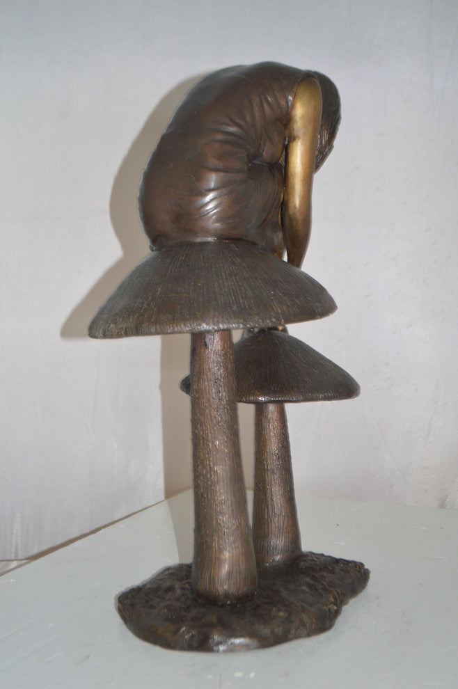 Girl sitting on Mushrooms Bronze Statue -  Size: 13"L x 11"W x 18"H.