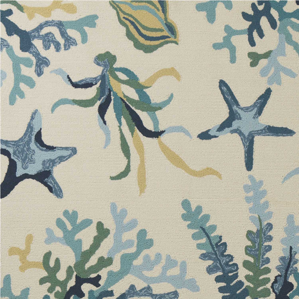 HomeRoots 7' x 9' UV treated Polypropylene Ivory or Blue Area Rug