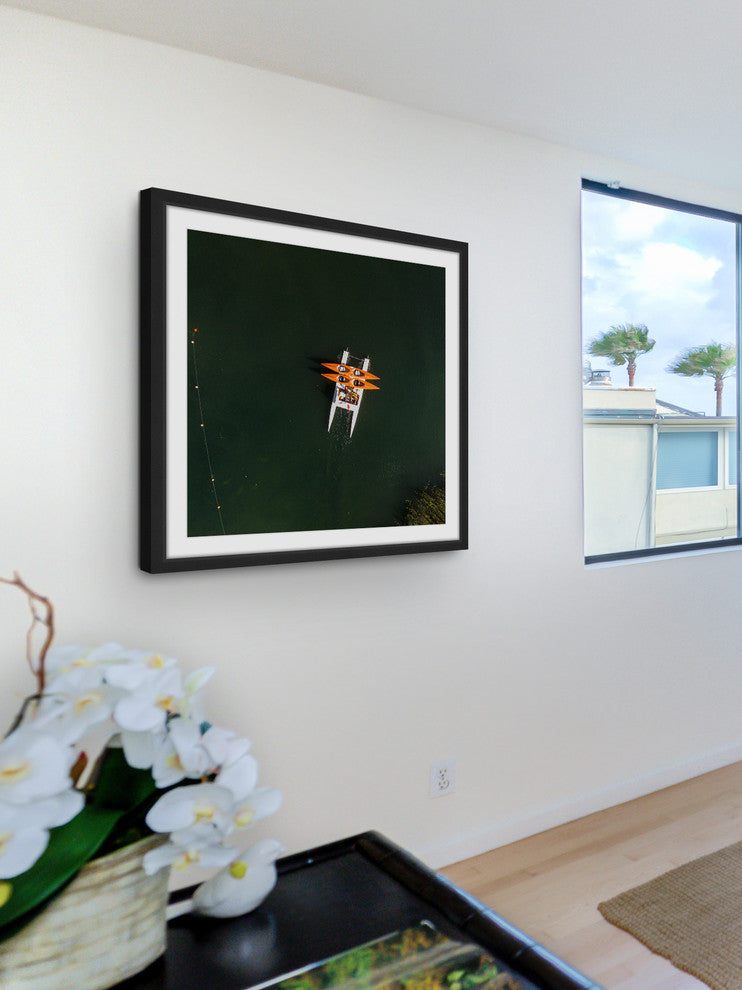 "Orange Kayaks" Framed Print by Karolis Janulis