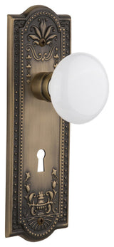 Double Meadows Plate With White Porcelain Knob, Antique Brass