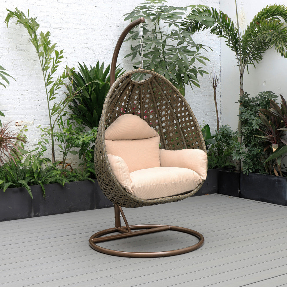 LeisureMod Beige Wicker Hanging Egg Swing Chair With Stand and Cushion, Beige