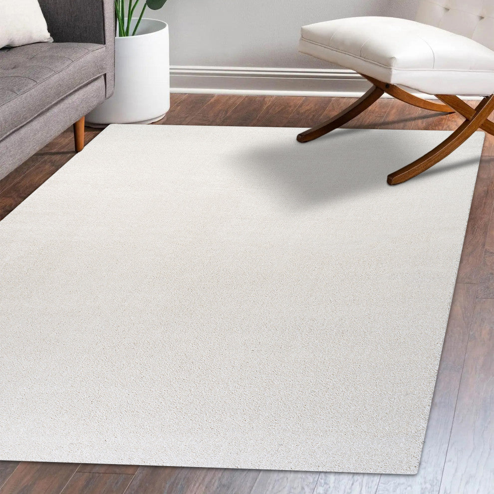 Haze Solid Low-Pile Cream 6 ft. x 9 ft. Area Rug