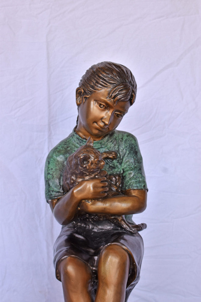Girl Sitting on A Log With Her Cat Bronze Statue Size: 15"L x 15"W x 35"H.