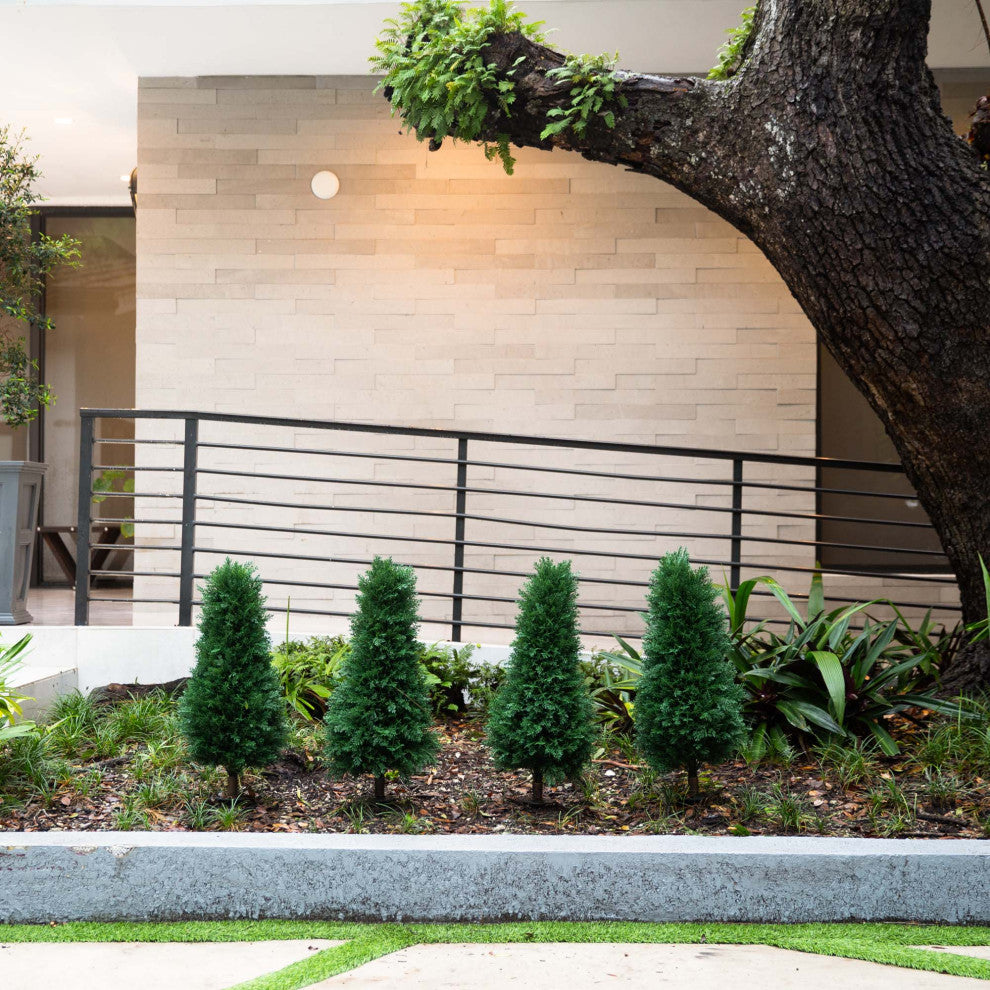 Lifestyle photo showing multiple units in a garden bed; real environment.