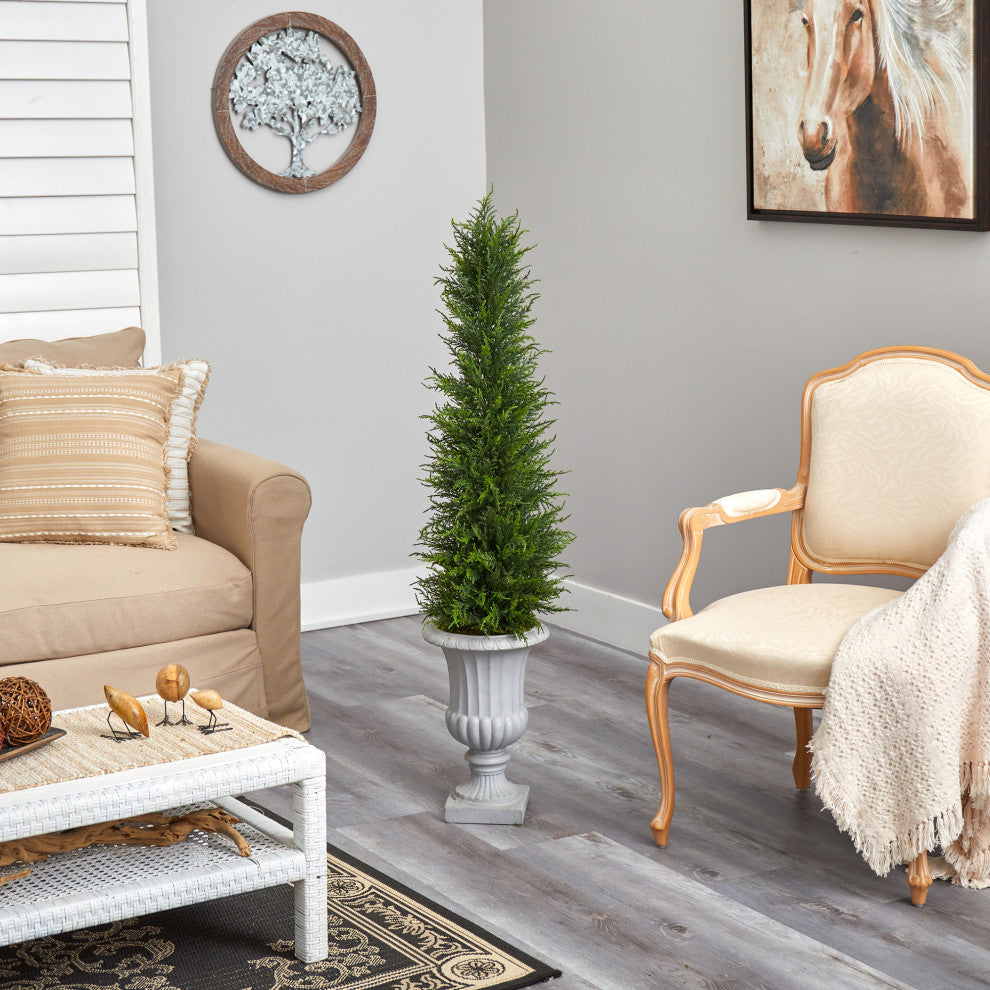 Lifestyle image showing the tree in a living room setting; no text overlays; full product visible.