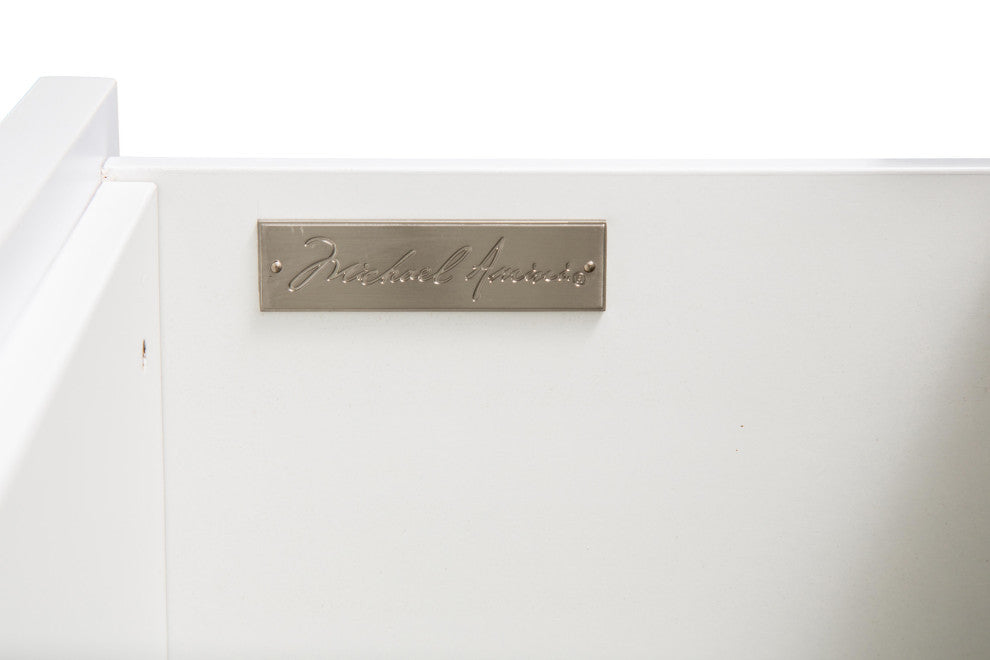 Close-up interior view of a drawer showing branding plaque on white background.