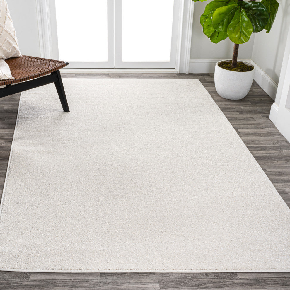 Haze Solid Low-Pile Cream 6 ft. x 9 ft. Area Rug