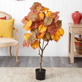 Lifestyle scene showing the tree in a home setting.