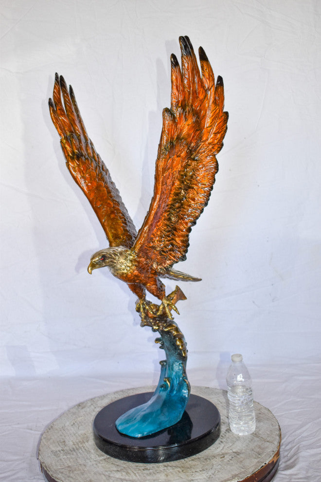 Eagle In Action Catching a Fish from Water Bronze Statue Size: 18" x 17" x 37"