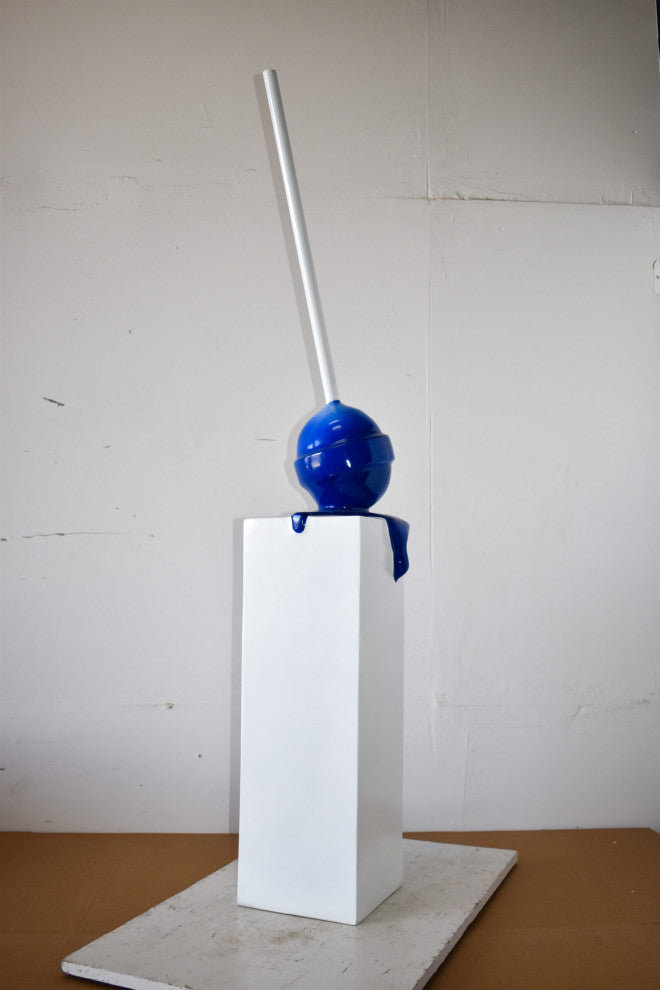 Blue Lollipop Mounted on A White Pedestal Resin Statue Size: 10" x 10" x 59"H