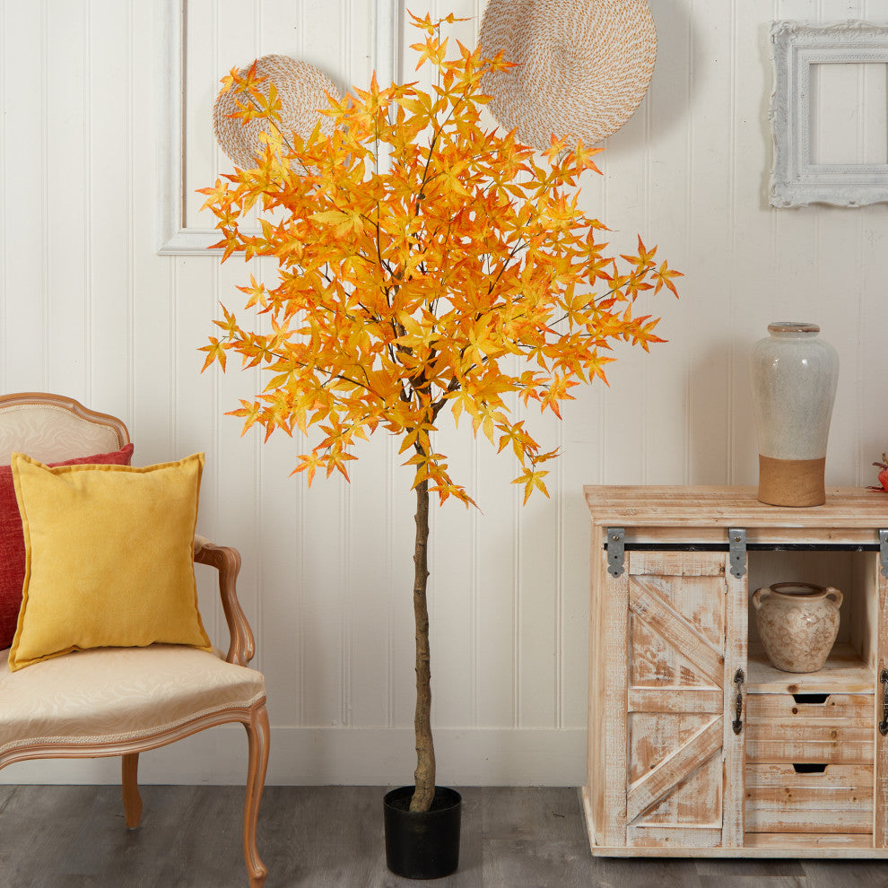 Another lifestyle image showing the product in a room; full tree visible.