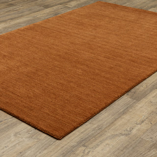 Apollo Heathered Solid Rust Hand-Made Wool Area Rug 6' x 9'