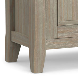 Close-up of bottom leg on white background.