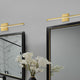 Aged Brass Modern Vanity With White Acrylic