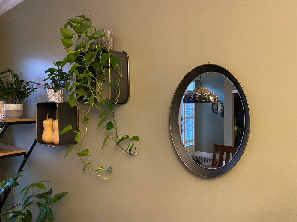 Oval metal decorative mirror