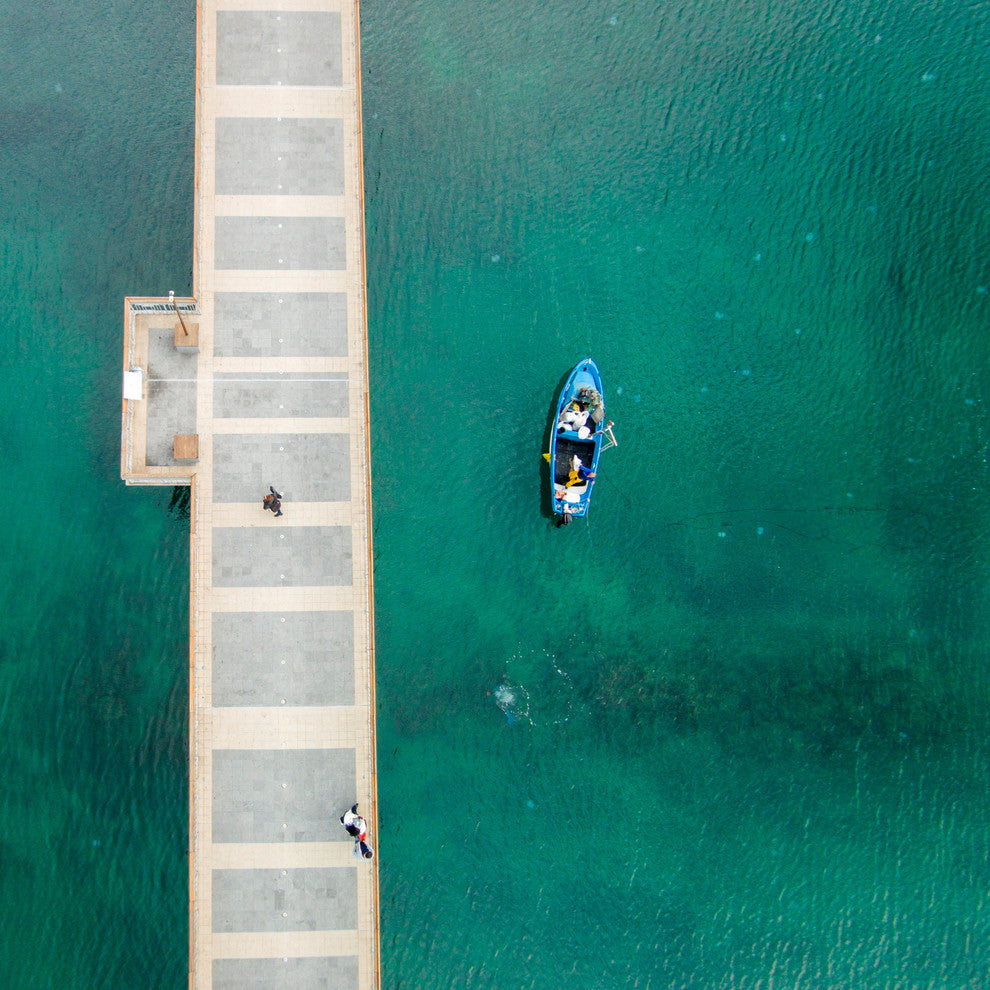 "Blue Boat Floats" Print on Canvas by Karolis Janulis