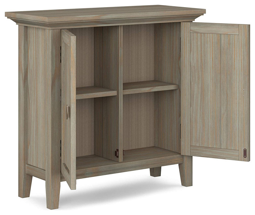Cabinet with doors open on white background, showing interior shelving.