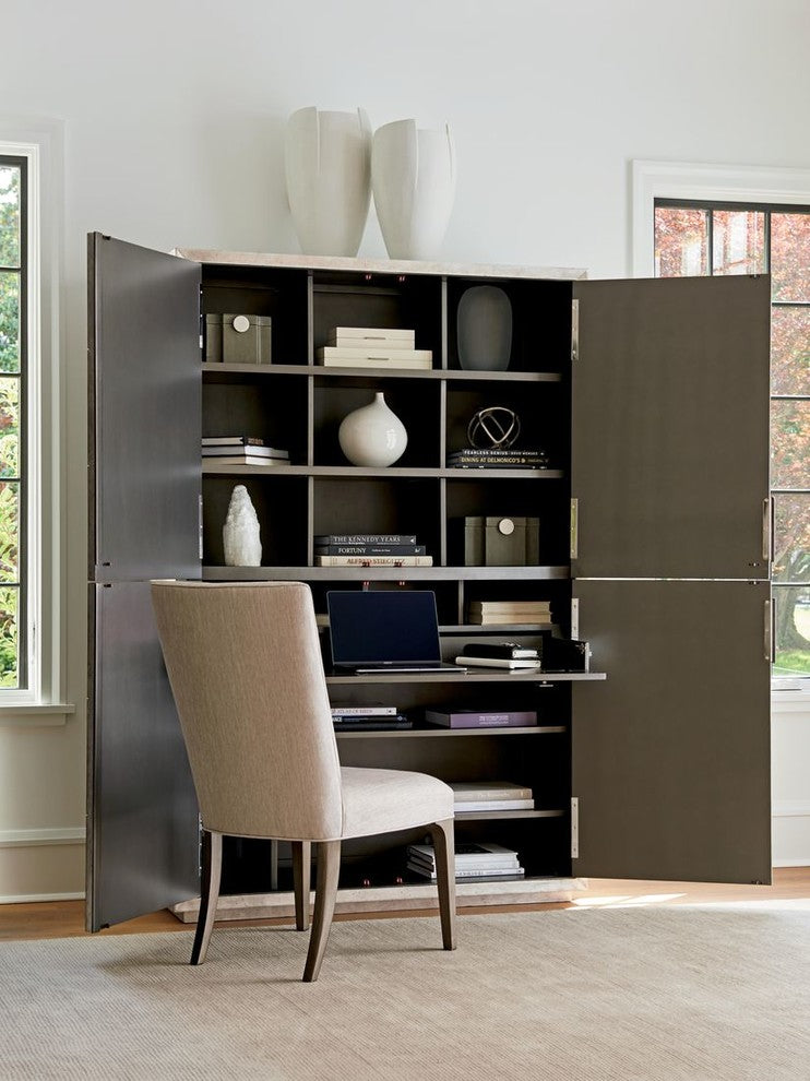 Lifestyle image with the cabinet open to reveal interior shelving in a room.