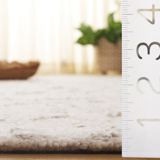 Safavieh Mykonos Collection MKN407 Rug, Ivory/Beige, 9'x12'