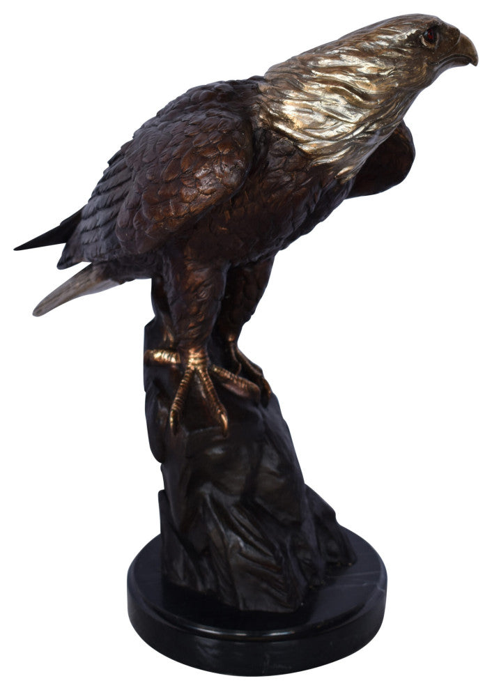 Eagle on Rock Bronze Statue Mounted on Marble Base Size: 10"L x 22"W x 21"H.