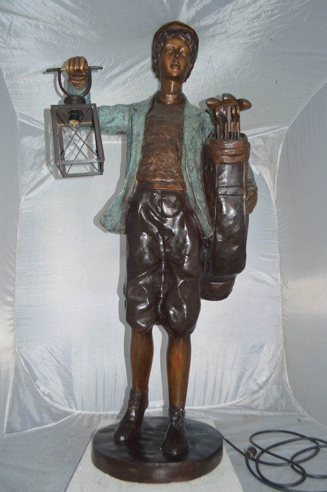 Caddy with light Bronze Statue -  Size: 30"L x 36"W x 64"H.