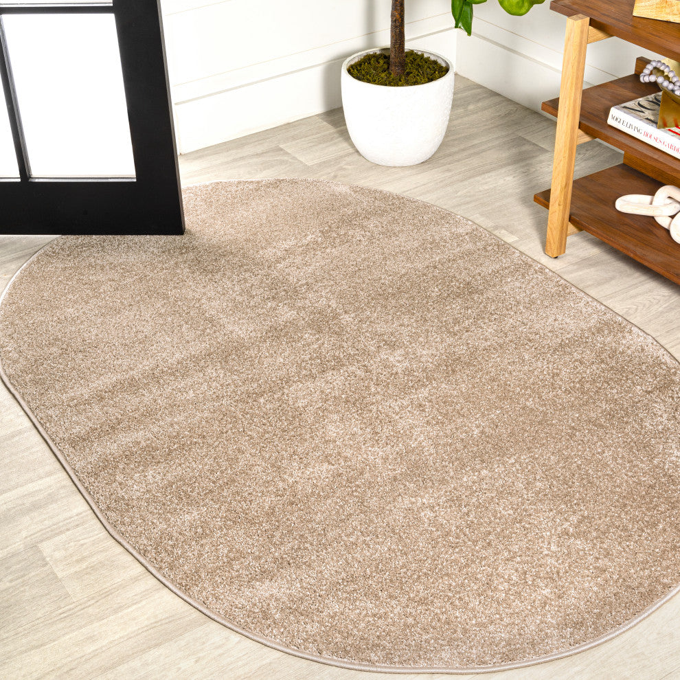 Haze Solid Low-Pile Beige 6 ft. x 9 ft. Oval Area Rug