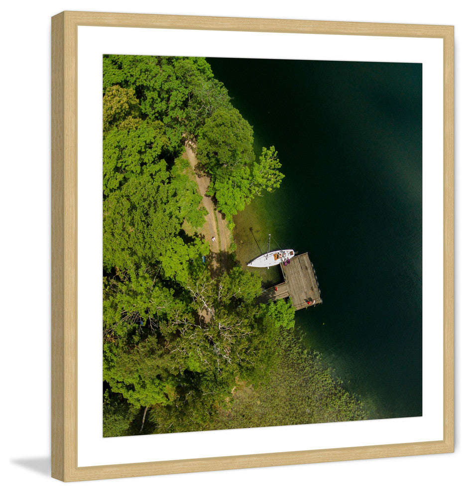 "Boat Dock" Framed Print by Karolis Janulis