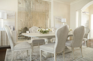 Lifestyle shot in a dining room with chairs; real environment and product fully visible.