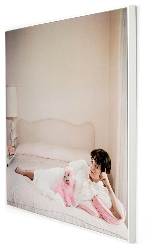 Joan Collins Relaxes By Slim Aarons
